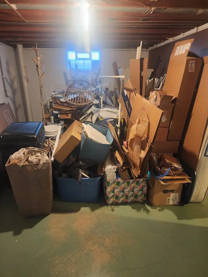 Roll-off dumpster container at job site for 20 Yard Dumpster Rental in Falmouth